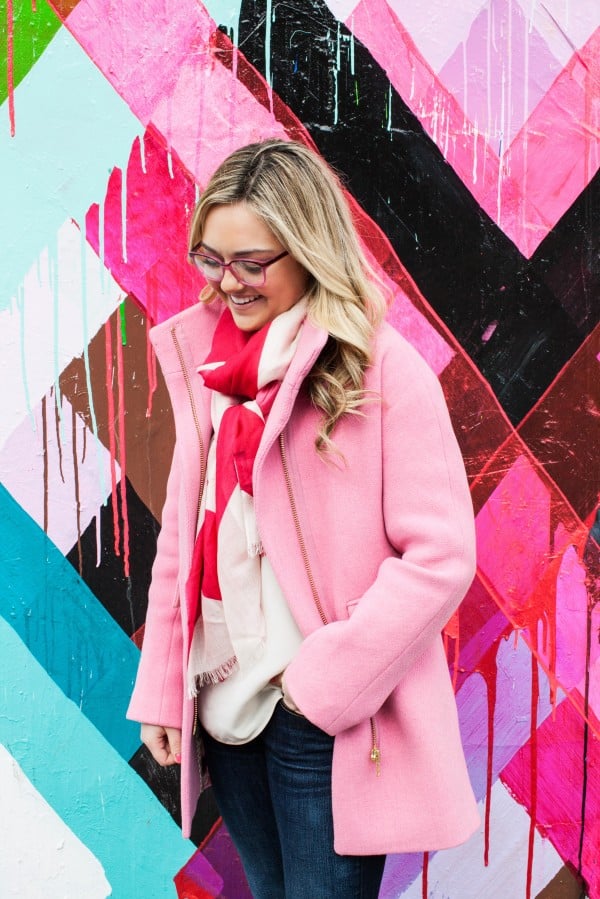 Bows & Sequins styling a pink coat and scarf in New York City. 