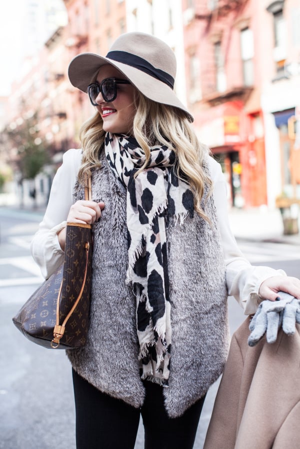 chic travel outfit hat scarf fur vest