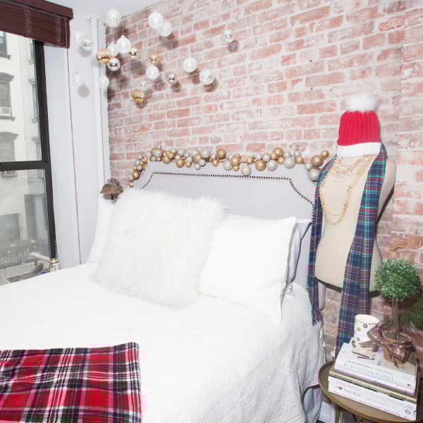 nailhead-headboard,-plaid-blanket,-west-elm-pillow,-restoration-hardware-bedding