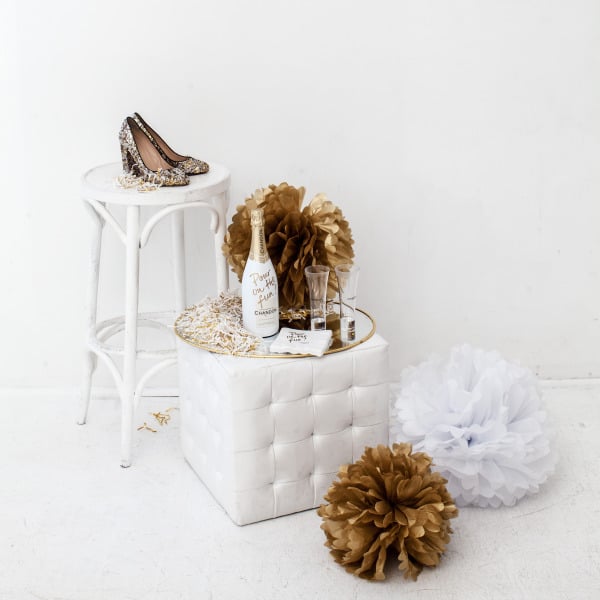white and gold pouf