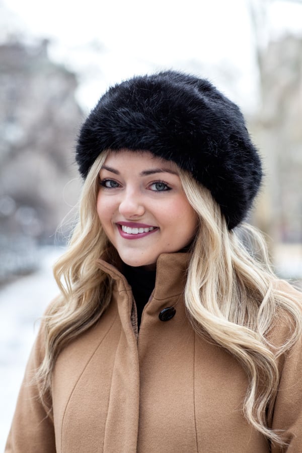 black faux fur hat camel wool coat