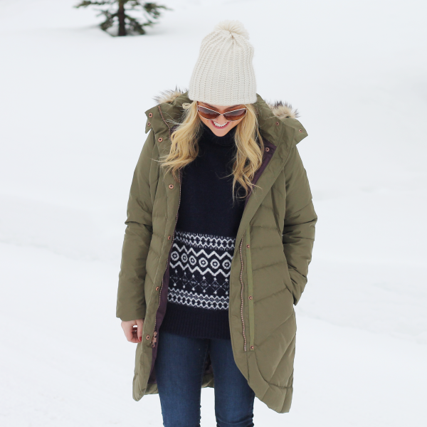 pom pom beanie, fair isle sweater, jeans, puffer coat winter outfit