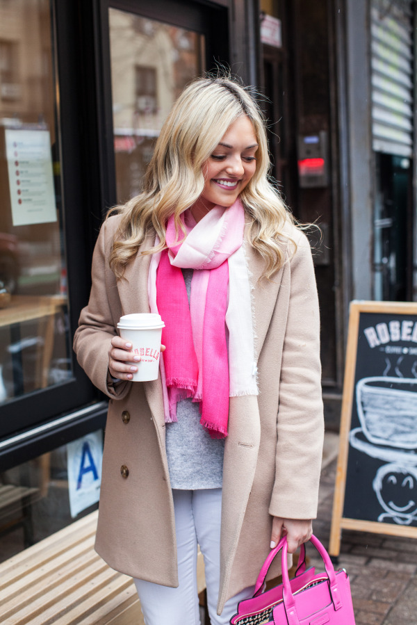 pink scarf with camel coat