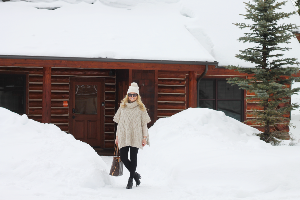 pom pom beanie, leggings, sweater cape poncho, booties