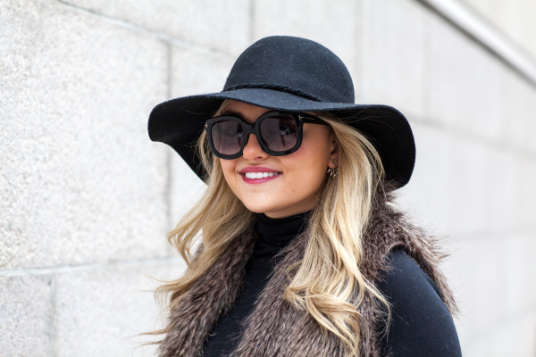 black floppy hat tom ford sunglasses faux fur vest