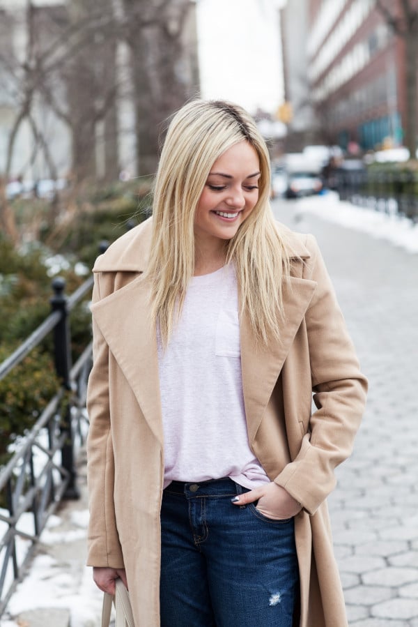blush pink top and camel coat