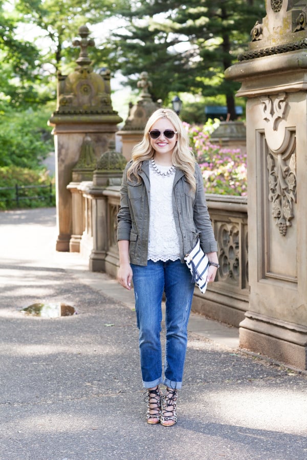 military jacket, lace top, boyfriend jeans, leopard sandals, stripe clutch