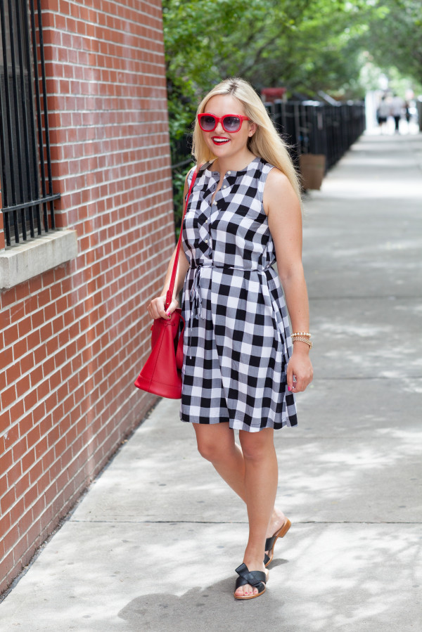 black and white dress with red accessories