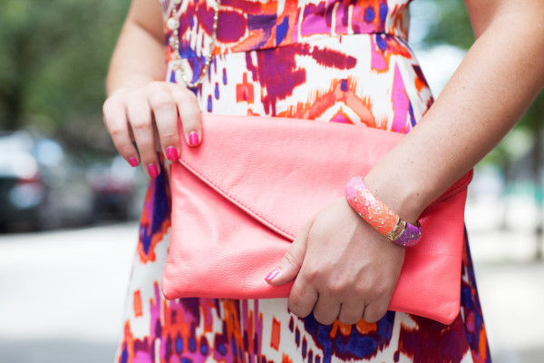 coral clutch, sequin bangle, ikat dress