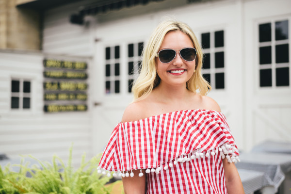 red gingham ruffle off the shoulder top with pom poms