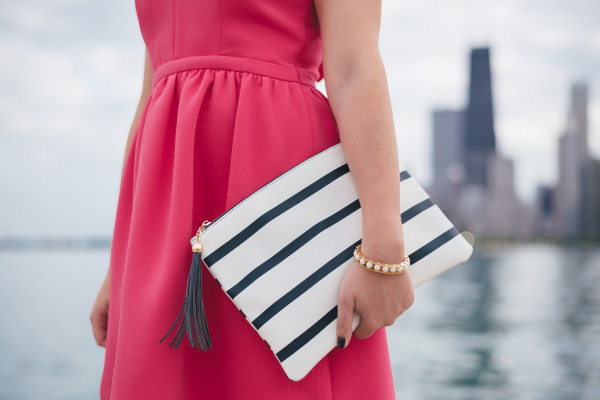 striped clutch with navy tassel