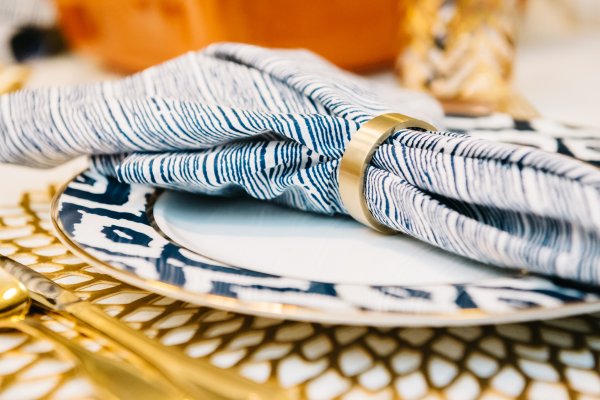 blue-and-white-napkins-brass-napkin-ring