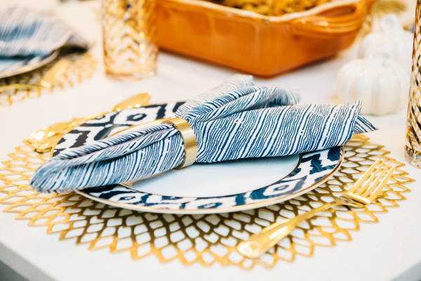 blue-and-white-place-setting-napkin-ring-dinner-place-placemat-gold-flatware