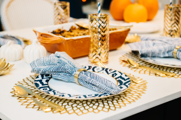 thanksgiving tablescape navy and orange and gold