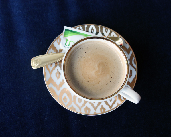 gold cappuccino cup and saucer