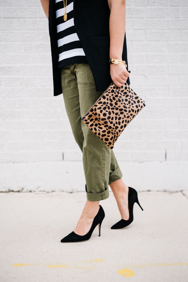 black pointed toe suede pumps, army green chino pants, leopard clutch