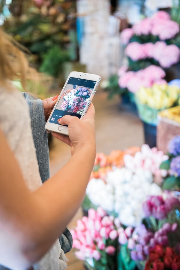 Fashion blogger, Jessica Sturdy, inside of A New Leaf flower shop on Wells Street in Lincoln Park in Chicago.