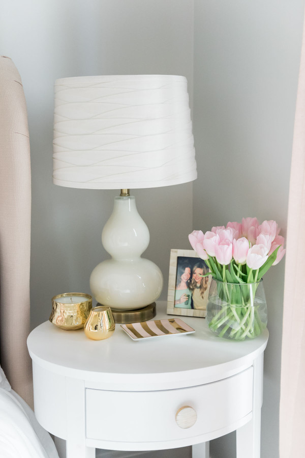 Blogger Jessica Sturdy of @bowsandsequins shares her Chicago Parisian-chic bedroom design. // Blush Pink and White with touches of Gold
