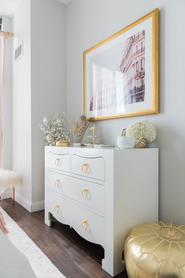 Blogger Jessica Sturdy of @bowsandsequins shares her Chicago Parisian-chic bedroom design. Paris buildings art print, Bungalow 5 White and Gold Jacqui Dresser.