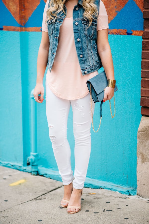 ripped white jeans outfit, denim vest, long tee shirt, cornflower blue handbag