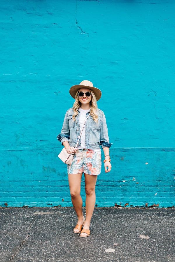 summer outfit ideas, straw hat, denim jacket, colorful shorts, leather sandals