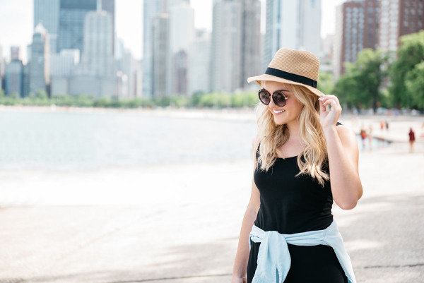 Bows & Sequins at North Avenue Beach in Chicago wearing a black maxi dress and chambray shirt.
