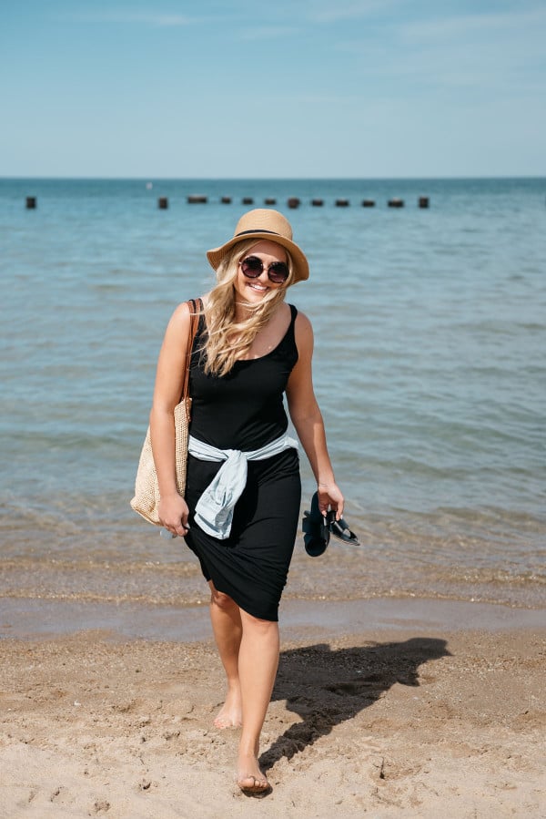 Sequins at North Avenue Beach in Chicago wearing a black maxi dress and chambray shirt.