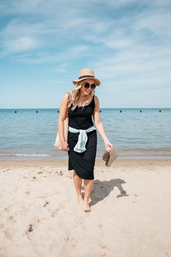 Sequins at North Avenue Beach in Chicago wearing a black maxi dress and chambray shirt.