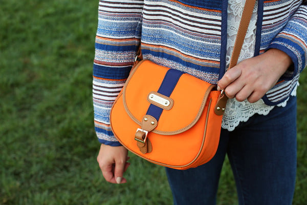 Bows & Sequins styling an outfit that's perfect for a cool college gameday!