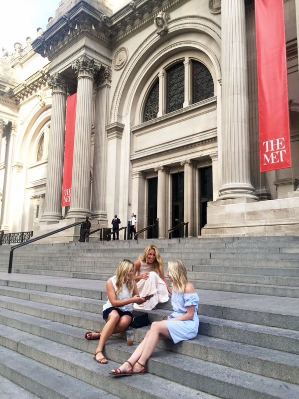 Girls on the steps of the Met Museum on Manhattan's Upper East Side in New York City like Gossip Girl