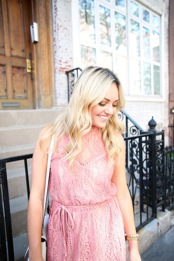 Blogger Bows & Sequins wearing a pink lace dress during NYFW paired with a glammed up everyday beauty look from Mary Kay!