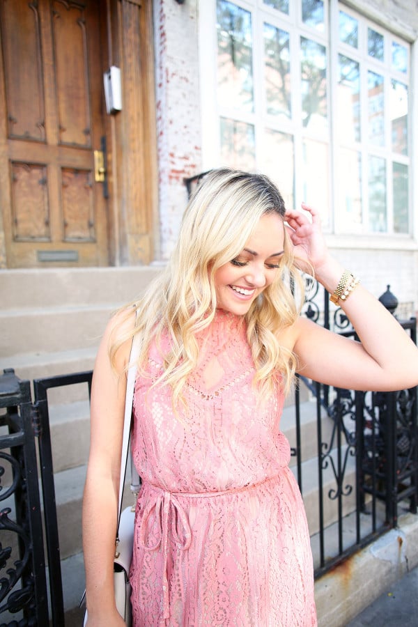 Blogger Bows & Sequins wearing a pink lace dress during NYFW paired with a glammed up everyday beauty look from Mary Kay!