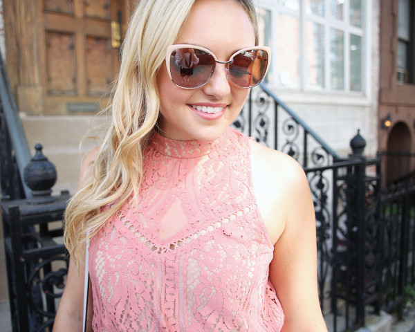 Fashion blogger Bows & Sequins wearing a Wayf pink lace dress with blush pink sunglasses. Makeup is Mary Kay!