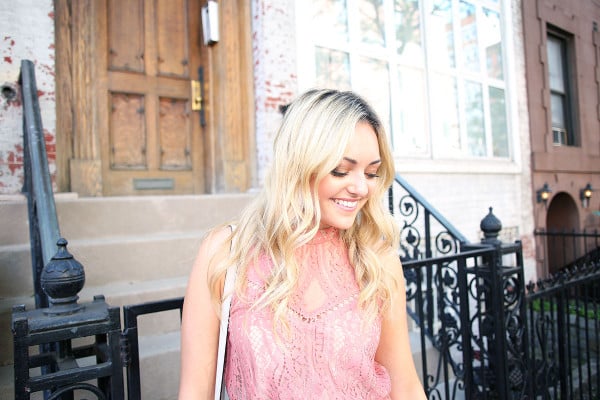Blogger Bows & Sequins wearing a pink lace dress during NYFW paired with a glammed up everyday beauty look from Mary Kay!