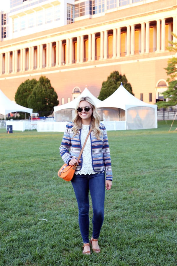 Bows & Sequins styling an outfit that's perfect for a cool college gameday! Orange & Blue striped jacket, lace tank, jeans, and a crossbody bag in school colors.