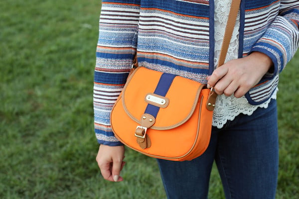 Bows & Sequins styling an outfit that's perfect for a cool college gameday! Orange & Blue Striped Crossbody Bag