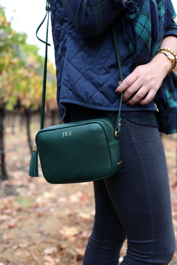 Bows & Sequins wearing a monogrammed tassel crossbody bag in Napa.