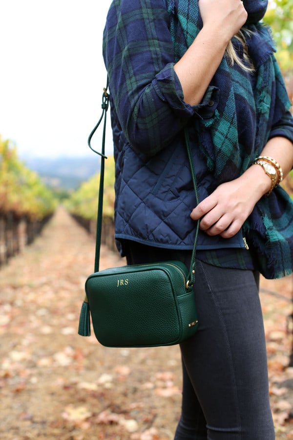 Bows & Sequins wearing a monogrammed tassel crossbody bag in Napa.