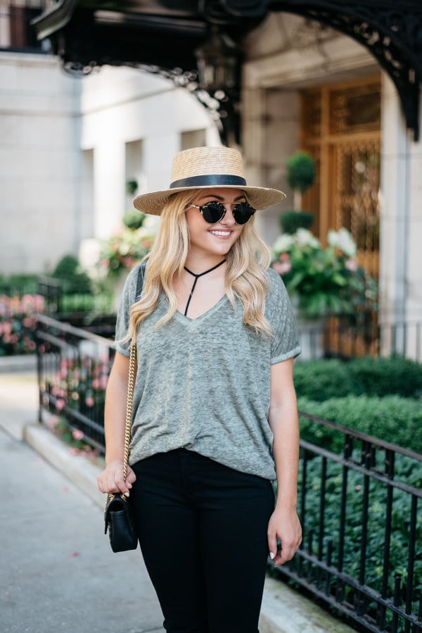 Bows & Sequins styling a casual outfit for fall. Janessa Leone Hat, Oversized Tee, Strappy Bralette, Frame Jeans, Illesteva Sunglasses, Gucci Bag with Chain Strap