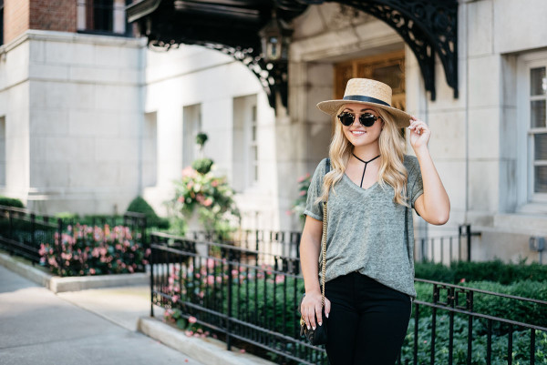 Bows & Sequins styling a casual outfit for fall. Janessa Leone Hat, Oversized Tee, Strappy Bralette, Frame Jeans, Illesteva Sunglasses, Gucci Bag with Chain Strap