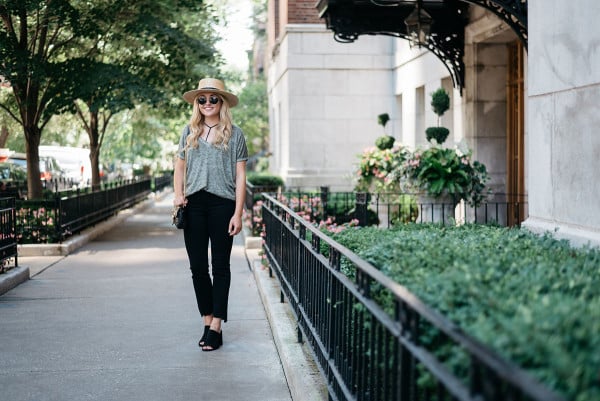 Bows & Sequins styling a casual outfit for fall. Janessa Leone Hat, Oversized Tee, Strappy Bralette, Frame Frayed Hem Jeans, Topshop Suede Mules, Illesteva Sunglasses, Gucci Bag with Chain Strap