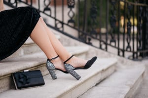 Bows & Sequins styling a pair of glitter heel mary jane pumps.