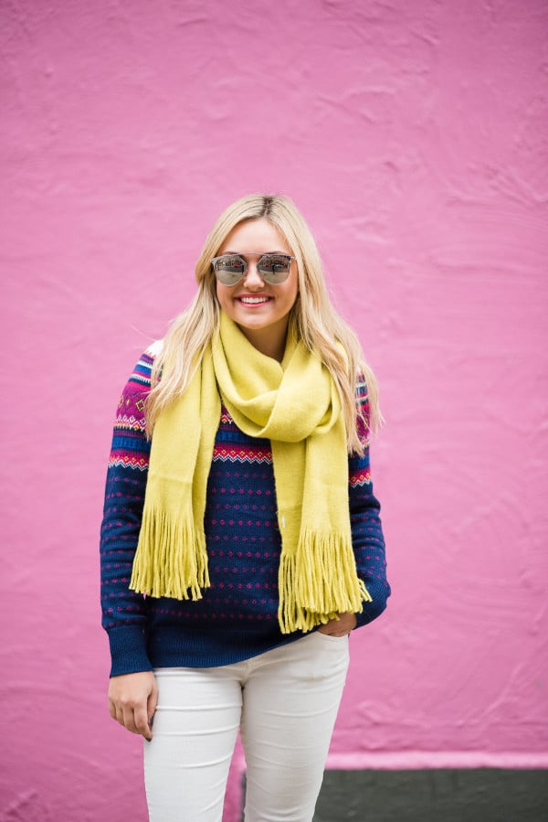 Bows & Sequins styling a pair of winter white corduroy pants with a fair isle sweater and bright scarf.