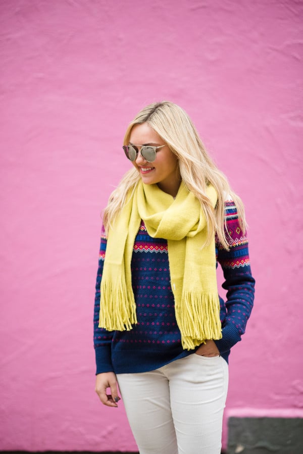 Bows & Sequins styling a pair of winter white corduroy pants with a fair isle sweater and bright scarf.