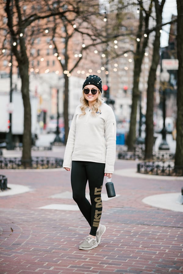 Bows & Sequins wearing a pearl beanie, Karen Walker sunglasses, a Patagonia pullover, Nike Just Do It Leggings, Nike Roche Flyknit Sneakers, and a BKR Water Bottle in Chicago's Gold Coast.