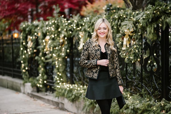 Bows & Sequins wearing a black and gold holiday outfit from Old Navy!