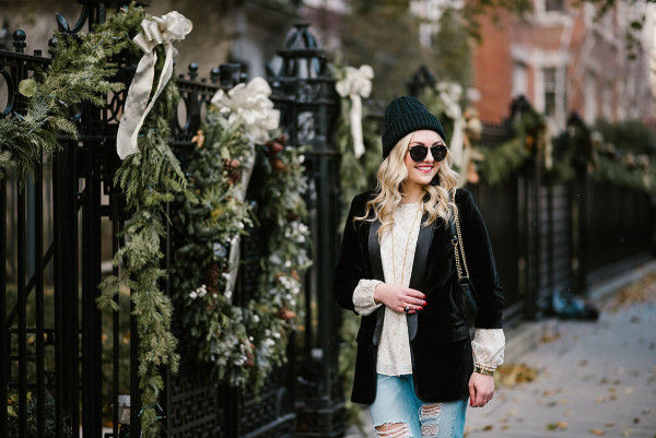 Bows & Sequins styling a long black velvet blazer with a beanie in Chicago.