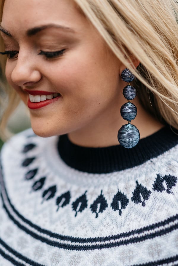 Bows & Sequins wearing the Must-Have Statement Earring of the Season: Bon-Bon Earrings! The perfect accessory for everything from fair isle sweaters to holiday party dresses. 