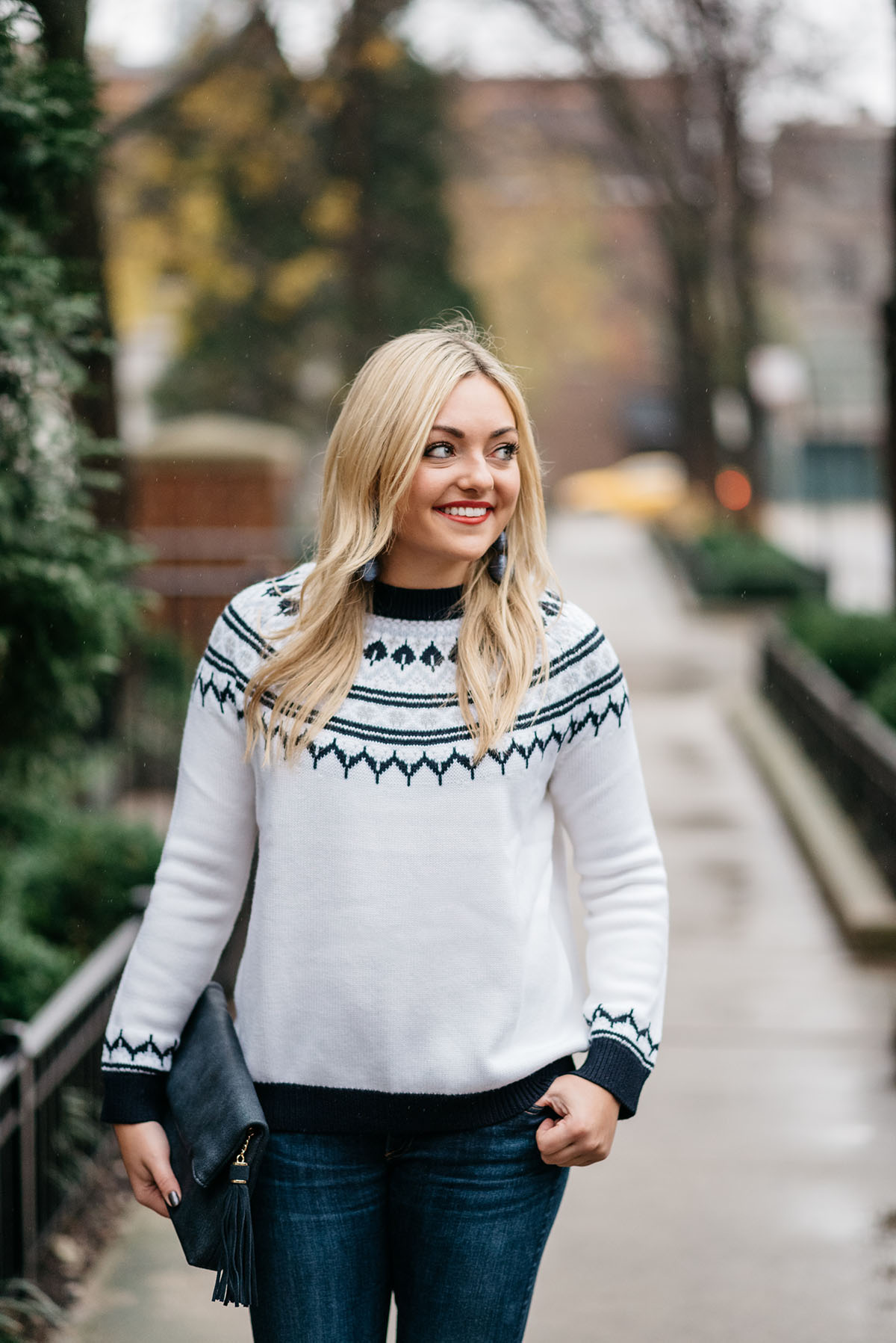 Bows & Sequins wearing a blue and white fair isle sweater from Tuckernuck.