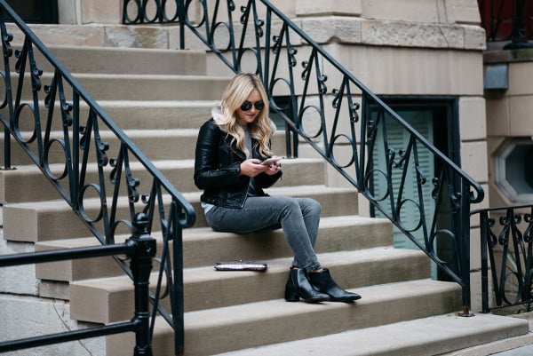 Bows & Sequins styling a pair of black ankle booties in Chicago.